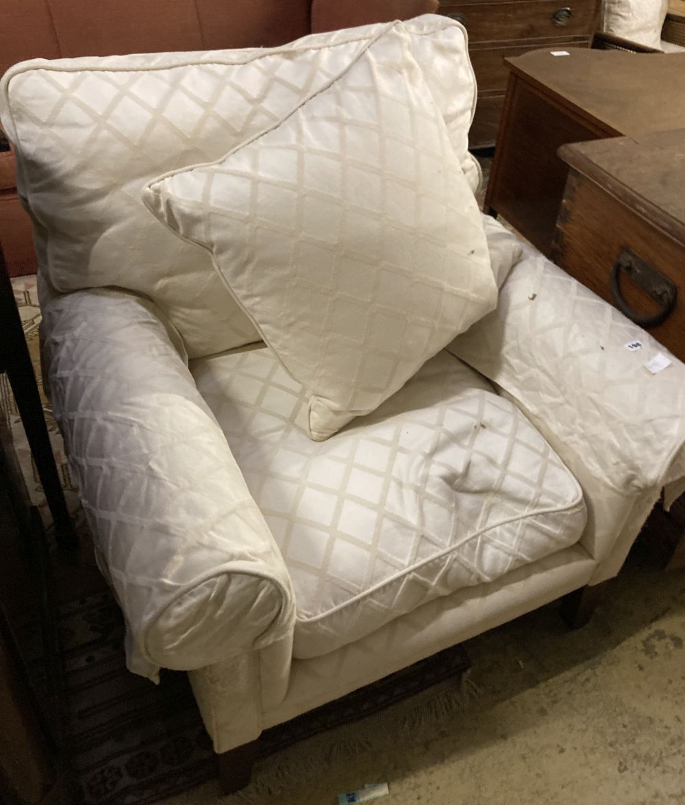 A pair of contemporary Highly Sprung upholstered armchairs